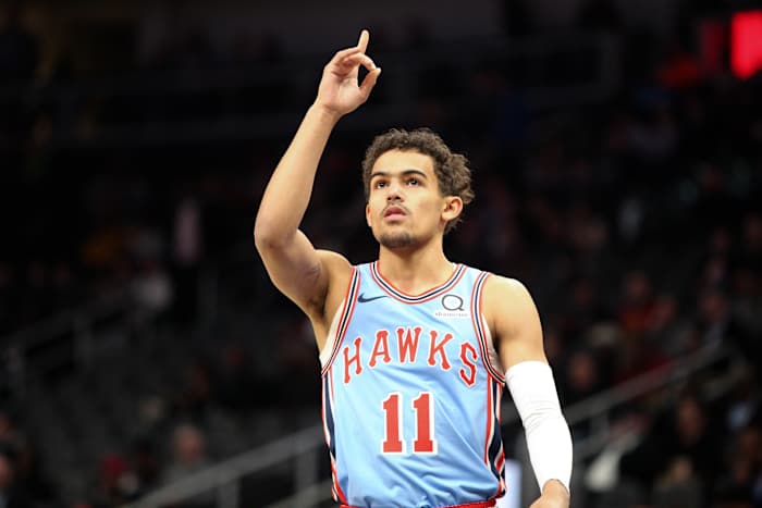 Atlanta Hawks guard Trae Young (11) motions skyward before a game against the Oklahoma City Thunder at State Farm Arena.